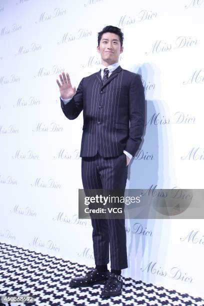 Actor Dou Xiao attends Miss Dior exhibition at Shanghai Urban Sculpture Center on June 19, 2014 in Shanghai, China.