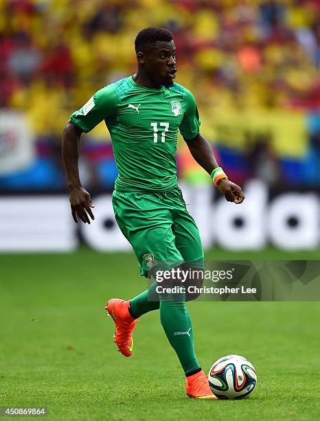 Serge Aurier of the Ivory Coast controls the ball during the 2014 FIFA World Cup Brazil Group C match between Colombia and Cote D'Ivoire at Estadio...