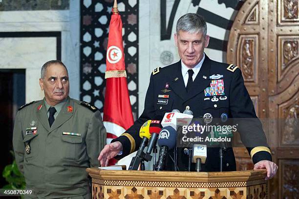 United States Army General David M. Rodriguez serving as the Commander for United States Africa Command meets with Ali Laarayedh the Tunisin PM on...