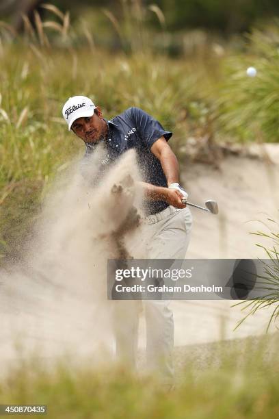 Gaganjeet Bhullar of India plays a shot from the bunker during day one of the World Cup of Golf at Royal Melbourne Golf Course on November 21, 2013...