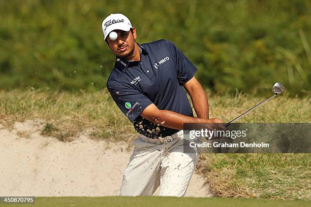 Gaganjeet Bhullar of India plays a shot from the bunker during day one of the World Cup of Golf at Royal Melbourne Golf Course on November 21, 2013...