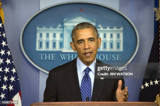 President Barack Obama makes a statement on Iraq from the press briefing room at the White House in Washington, DC, June 19, 2014. AFP PHOTO / Jim...