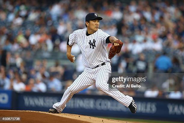 Masahiro Tanaka of the New York Yankees pitches against the Toronto Blue Jays in the first inning during their game at Yankee Stadium on June 17,...
