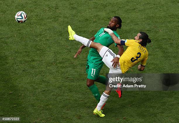 Didier Drogba of the Ivory Coast competes for the ball with Mario Yepes of Colombia during the 2014 FIFA World Cup Brazil Group C match between...