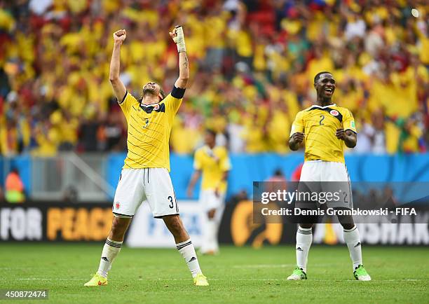 Mario Yepes and Cristian Zapata of Colombia celebrate the 2-1 win after the 2014 FIFA World Cup Brazil Group C match between Colombia and Cote...