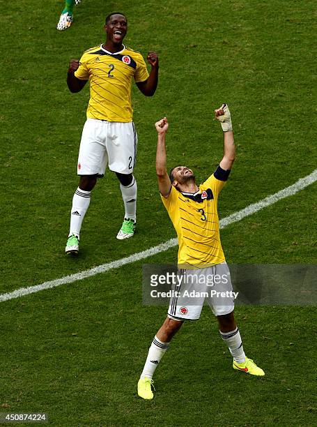 Mario Yepes and Cristian Zapata of Colombia celebrate a 2-1 victory in the 2014 FIFA World Cup Brazil Group C match between Colombia and Cote...