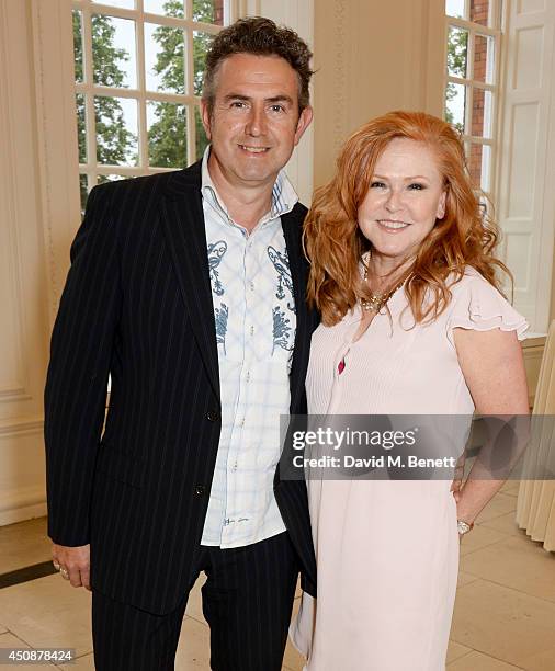 Richard Coates and Carol Decker attend the drinks reception hosted by Dockers, the San Francisco based apparel brand, at Kensington Palace on the eve...