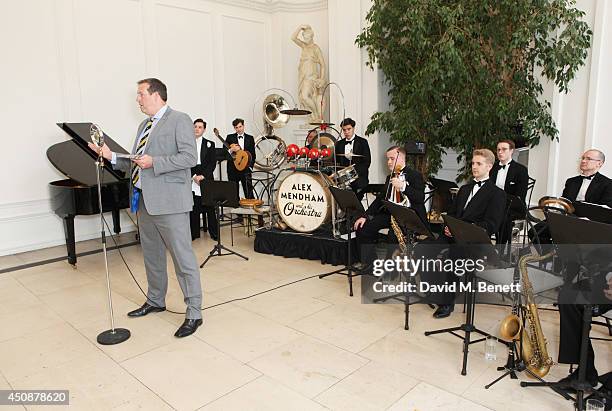 Cricketer Tim Munton speaks attends the drinks reception hosted by Dockers, the San Francisco based apparel brand, at Kensington Palace on the eve of...