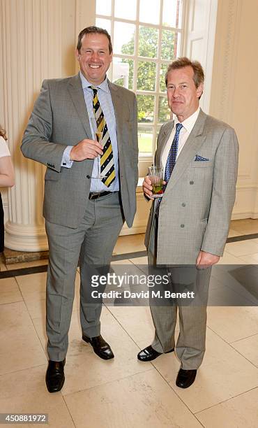 Tim Munton and Lord Ivar Mountbatten attend the drinks reception hosted by Dockers, the San Francisco based apparel brand, at Kensington Palace on...