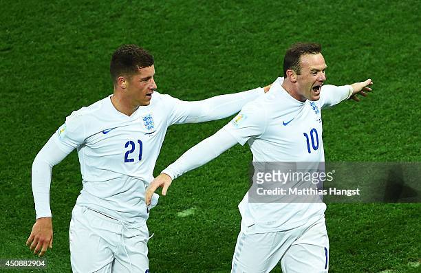 Wayne Rooney of England celebrates scoring his team's first goal with Ross Barkley during the 2014 FIFA World Cup Brazil Group D match between...