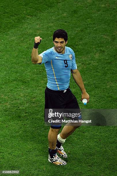 Luis Suarez of Uruguay celebrates after defeating England 2-1 during the 2014 FIFA World Cup Brazil Group D match between Uruguay and England at...