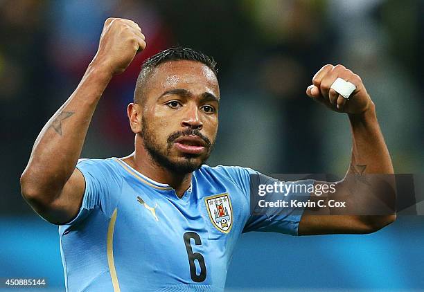 Alvaro Pereira of Uruguay acknowledges the fans after a 2-1 victory in the 2014 FIFA World Cup Brazil Group D match between Uruguay and England at...