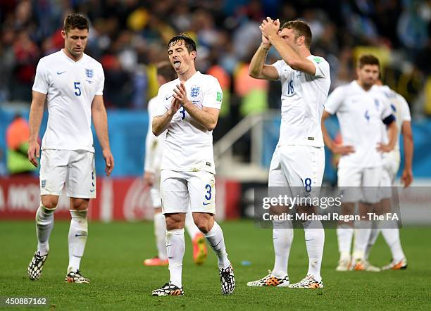 Leighton Baines and Rickie Lambert of England acknowledge the fans after a 2-1 defeat in the 2014 FIFA World Cup Brazil Group D match between Uruguay...