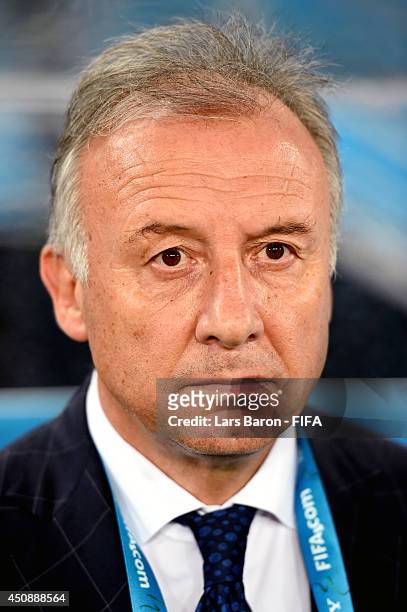 Head coach Alberto Zaccheroni of Japan looks on prior to the 2014 FIFA World Cup Brazil Group C match between Japan and Greece at Estadio das Dunas...