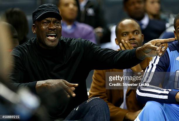 Michael Jordan, owner of the Charlotte Bobcats, yells at a referee after a call during their game against the Brooklyn Nets at Time Warner Cable...
