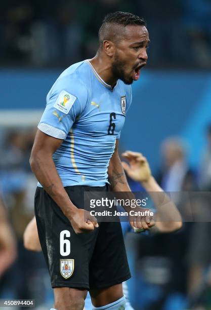 Alvaro Pereira of Uruguay celebrates the victory at the end of the 2014 FIFA World Cup Brazil Group D match between Uruguay and England at Arena de...