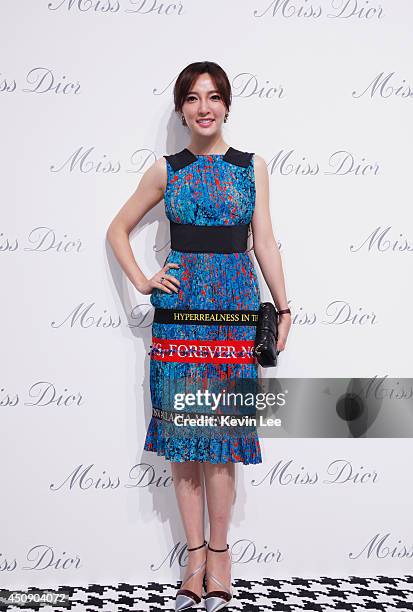 Socialite Constence poses for a picture at Miss Dior Exhibition on June 19, 2014 in Shanghai, China.