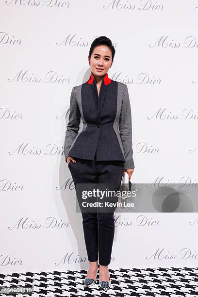 Actress Ye Xuan poses for a picture at Miss Dior Exhibition on June 19, 2014 in Shanghai, China.