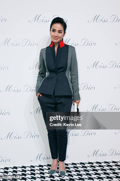 Actress Ye Xuan poses for a picture at Miss Dior Exhibition on June 19, 2014 in Shanghai, China.