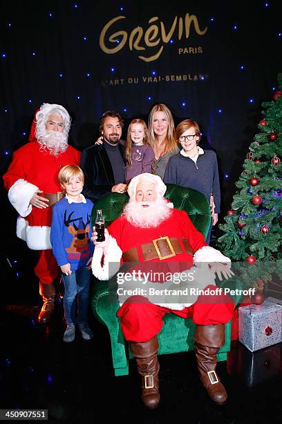 Henri Leconte with his wife Florentine Leconte and their children Marylou, Ulysse and Jules with the model and the Christmas Father Waxwork attend...