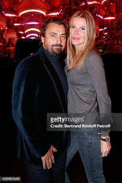 Former tennis player Henri Leconte and his wife Florentine Waters attend Coca Cola Christmas Father Waxwork Unveiling Event at Musee Grevin on...