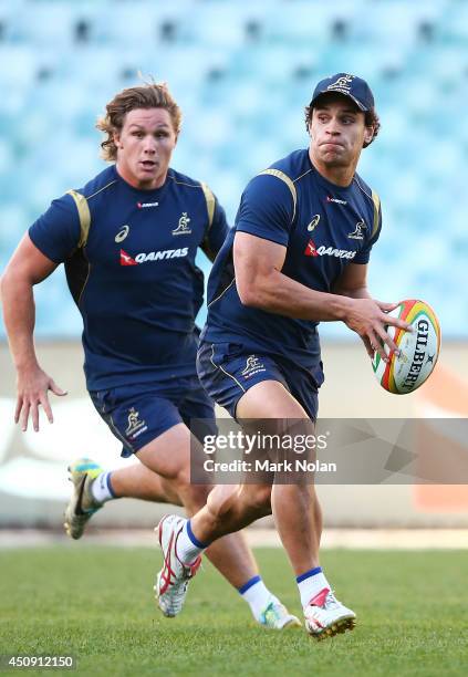 Matt Toomua runs the ball during an Australian Wallabies Captain's Run at Allianz Stadium on June 20, 2014 in Sydney, Australia.