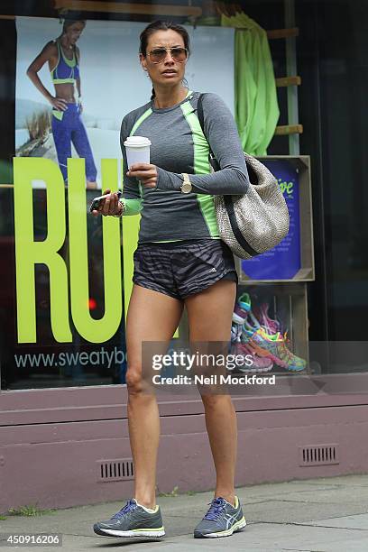 Melanie Sykes is seen taking a walk in Hampsted with a coffee before paying a visit to the gym on June 19, 2014 in London, England.