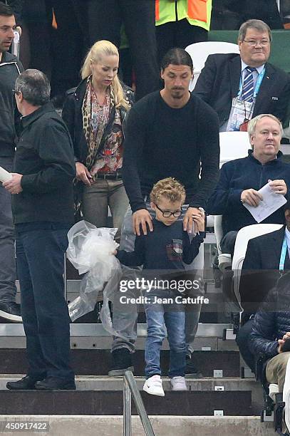 Zlatan Ibrahimovic, his son Vincent Ibrahimovic and his wife Helena Seger attend the 2014 FIFA World Cup Brazil Group D match between Uruguay and...