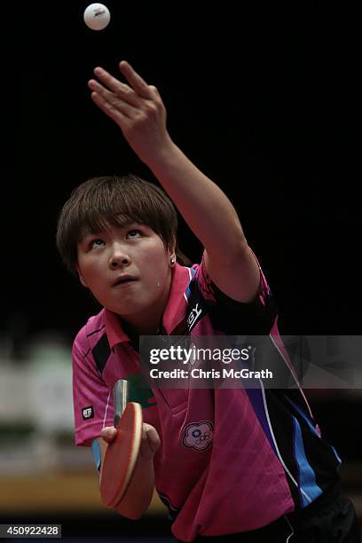 Chen Szu-Yu of Taipei serves against Tashiro Saki of Japan during their Women's Singles match on day one of 2014 ITTF World Tour Japan Open at...