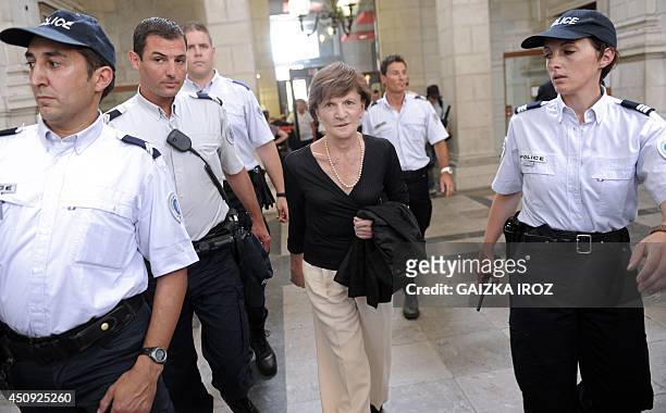 Former French Minister Michele Delaunay arrives to testify at the courthouse of Pau, southwestern France, on June 20, 2014. French former doctor at...