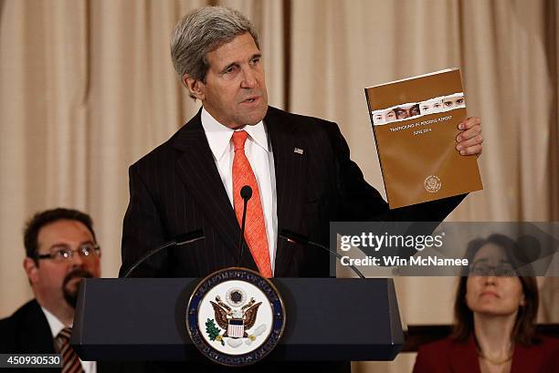 Secretary of State John Kerry speaks during a ceremony releasing the 2014 Trafficking in Persons Report at the State Department June 20 in...