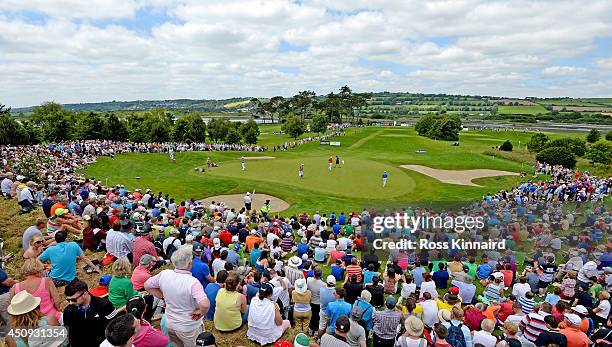 Crowds gather around the 7th green for the Harrington, McIlroy and Gallacher group during the second round of the Irish Open at the Fota Island...