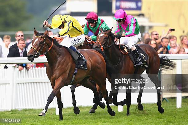 Jockey Ryan Moore riding Rizeena wins the Coronation Stakes during day four of Royal Ascot at Ascot Racecourse on June 20, 2014 in Ascot, England.