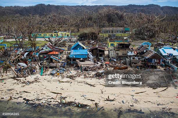 Destroyed buildings stand among debris in Sulyan Village on the coastline of Eastern Samar, the Philippines, on Wednesday, Nov. 20, 2013. Super...