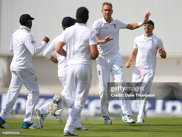 Stuart Broad of England celebrates taking a hat-trick after claiming the wicket of Shaminda Eranga of Sri Lanka during day one of 2nd Investec Test...