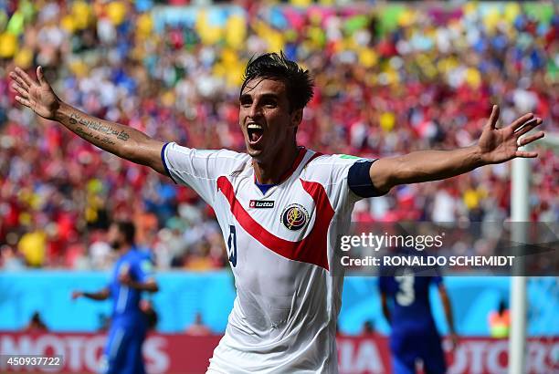 Costa Rica's forward Bryan Ruiz celebrates after scoring his team's first goal during a Group D match between Italy and Costa Rica at the Pernambuco...