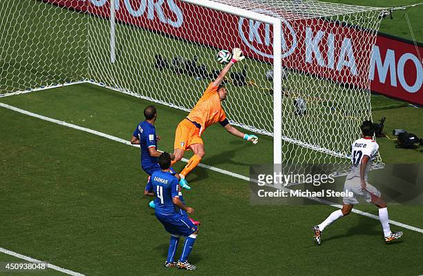 Bryan Ruiz of Costa Rica scores his team's first goal past Gianluigi Buffon of Italy during the 2014 FIFA World Cup Brazil Group D match between...