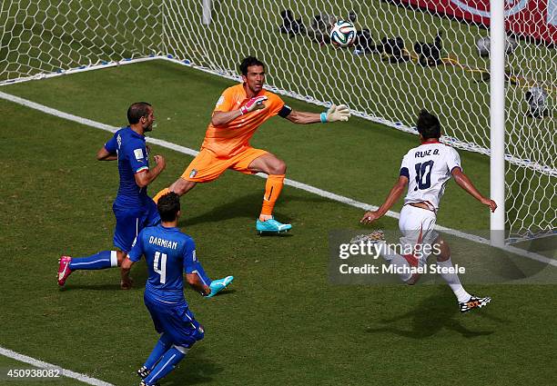Bryan Ruiz of Costa Rica scores his team's first goal past Gianluigi Buffon of Italy during the 2014 FIFA World Cup Brazil Group D match between...
