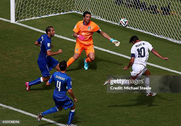 Bryan Ruiz of Costa Rica scores his team's first goal on a header past Gianluigi Buffon of Italy during the 2014 FIFA World Cup Brazil Group D match...