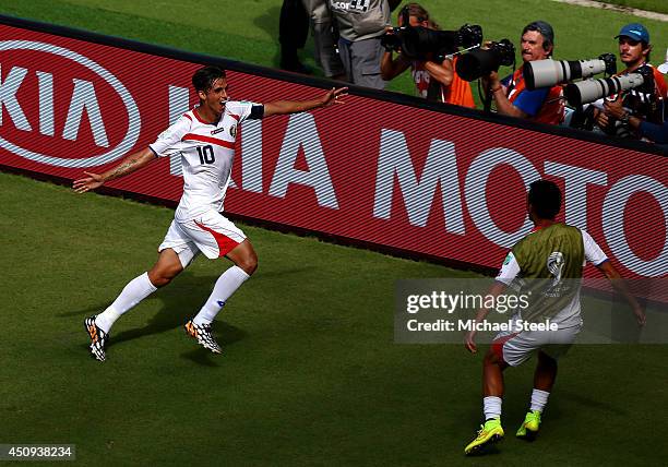Bryan Ruiz of Costa Rica celebrates scoring his team's first goal during the 2014 FIFA World Cup Brazil Group D match between Italy and Costa Rica at...