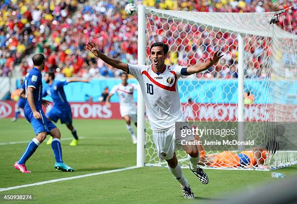 Bryan Ruiz of Costa Rica celebrates scoring his team's first goal during the 2014 FIFA World Cup Brazil Group D match between Italy and Costa Rica at...