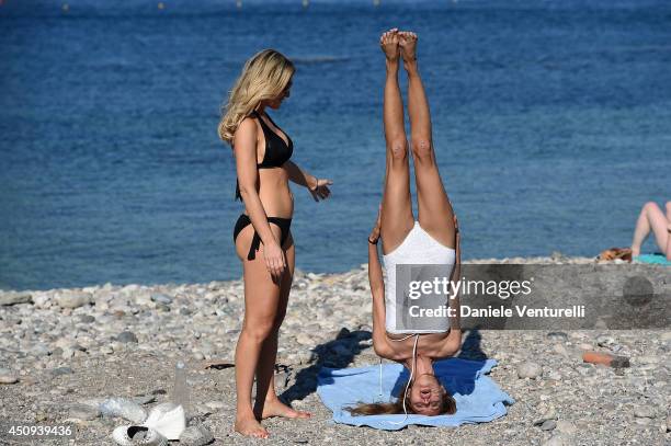 Hofit Golan and Victoria Bonya are in the beach during the 60th Taormina Film Fest 2014 at Isola Bella on June 20, 2014 in Taormina, Italy.