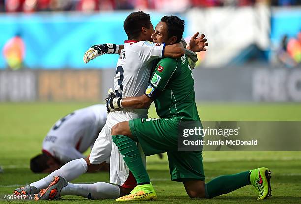 Oscar Granados and Keylor Navas of Costa Rica celebrate after defeating Italy 1-0 during the 2014 FIFA World Cup Brazil Group D match between Italy...