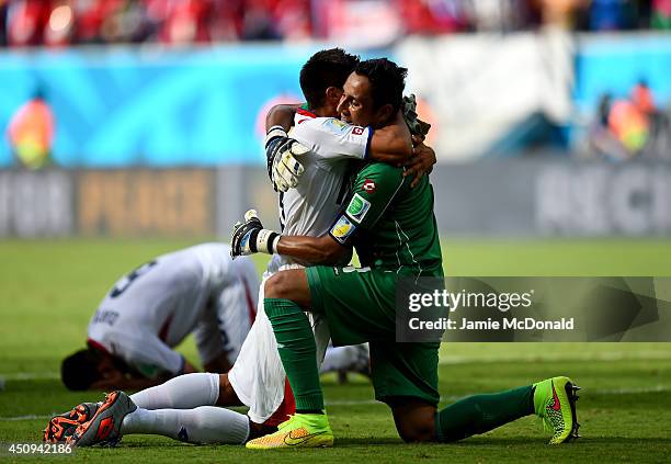 Oscar Granados and Keylor Navas of Costa Rica celebrate a 1-0 victory in the 2014 FIFA World Cup Brazil Group D match between Italy and Costa Rica at...