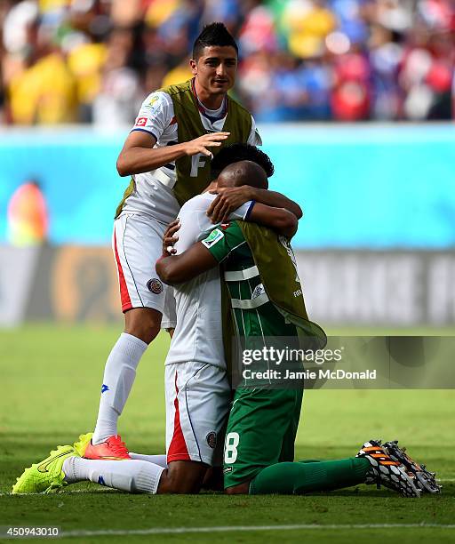 Oscar Granados and Keylor Navas of Costa Rica celebrate after defeating Italy 1-0 during the 2014 FIFA World Cup Brazil Group D match between Italy...