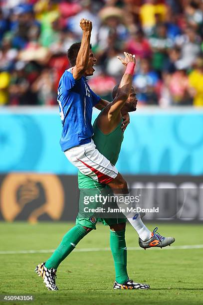 Goalkeeper Patrick Pemberton of Costa Rica celebrates with teammate Oscar Granados after defeating Italy 1-0 during the 2014 FIFA World Cup Brazil...