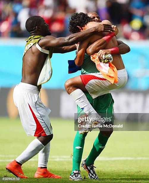 Waylon Francis, Patrick Pemberton and Yeltsin Tejeda of Costa Rica celebrate after defeating Italy 1-0 during the 2014 FIFA World Cup Brazil Group D...