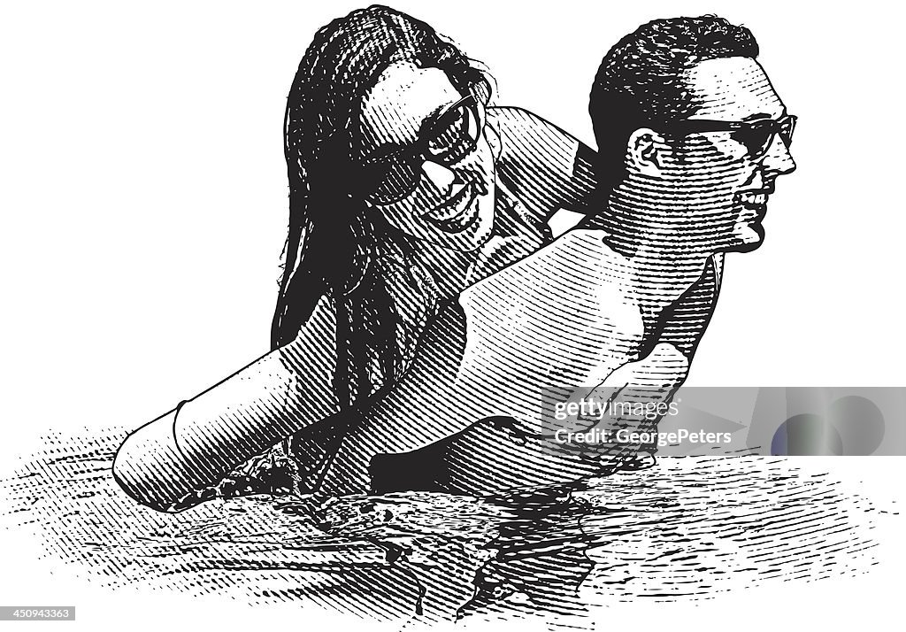 Romantic Young Couple in Swimming Pool