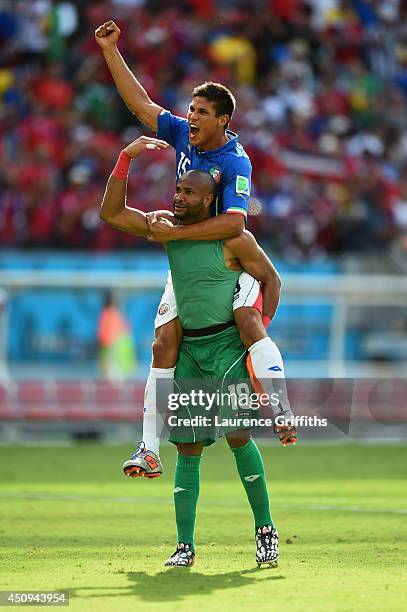 Goalkeeper Patrick Pemberton of Costa Rica celebrates with teammate Oscar Granados after defeating Italy 1-0 during the 2014 FIFA World Cup Brazil...