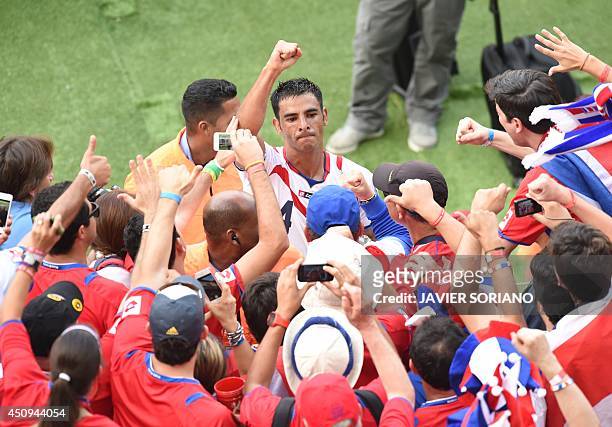 Costa Rica's defender Michael Umana celebrates at the end of the game after their team won 1-0 during a Group D match between Italy and Costa Rica at...
